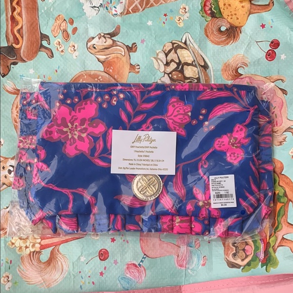 Lilly Pulitzer Handbags - Lilly Pulitzer Blue and Pink Floral Clutch